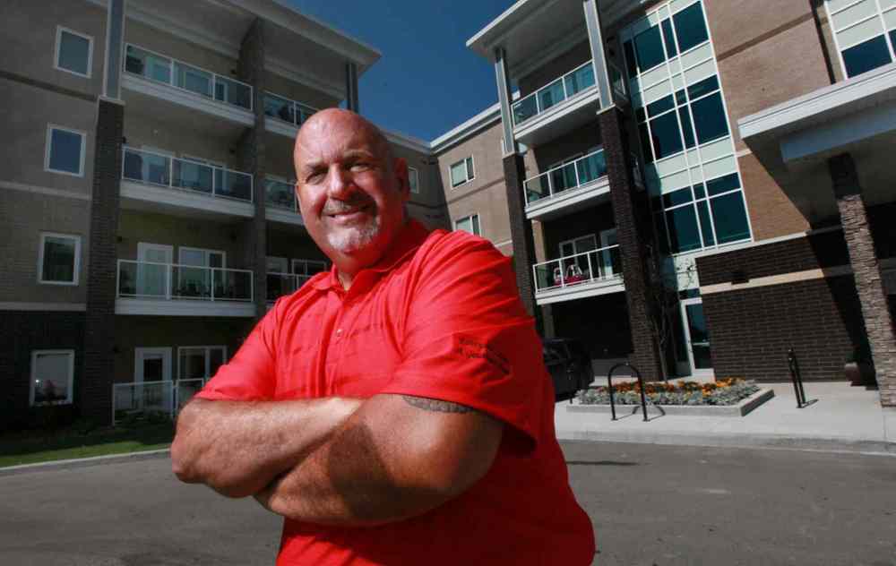 Phil Hossack / Winnipeg Free Press
Randy Gauthier in front of the Lady Joyce 90-unit luxury apartment complex the Gauthier Automotive Group built on a piece of land it owns near its car dealership.