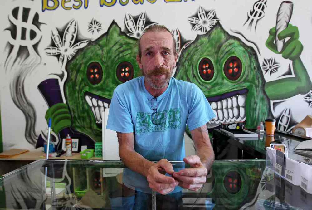 Glenn Price, owner of a medical marijuana shop says his wrists are still swollen from being handcuffed after his recent arrest. (Ruth Bonneville / Winnipeg Free Press files)