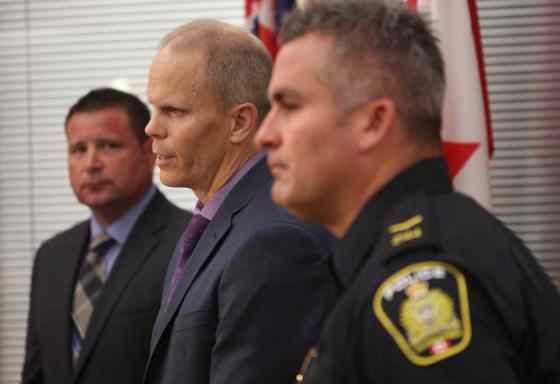 L to R- Acting Inspector Gene Bowers Winnipeg Police Service Counter Exploitation Unit (CEU) with Cam MacKid of CEU and Constable Jason Michalyshen speak of charges from Project Create, an initiative to combat the sex trade in Winnipeg. (Joe Bryksa / Winnipeg Free Press)