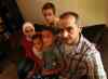 PHIL HOSSACK / WINNIPEG FREE PRESS
Jude Kasas came here as a student 15 years ago and has built a life with his wife, Alia Harb, daughter, Dujahn, and sons, Kemiee and Jadd (back row).