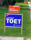NDP Daniel Blaikie and Lawrence Toet signs cover Elmwood-Transcona, which was a very close race in the 2011 election. (Boris Minkevich / Winnipeg Free Press)