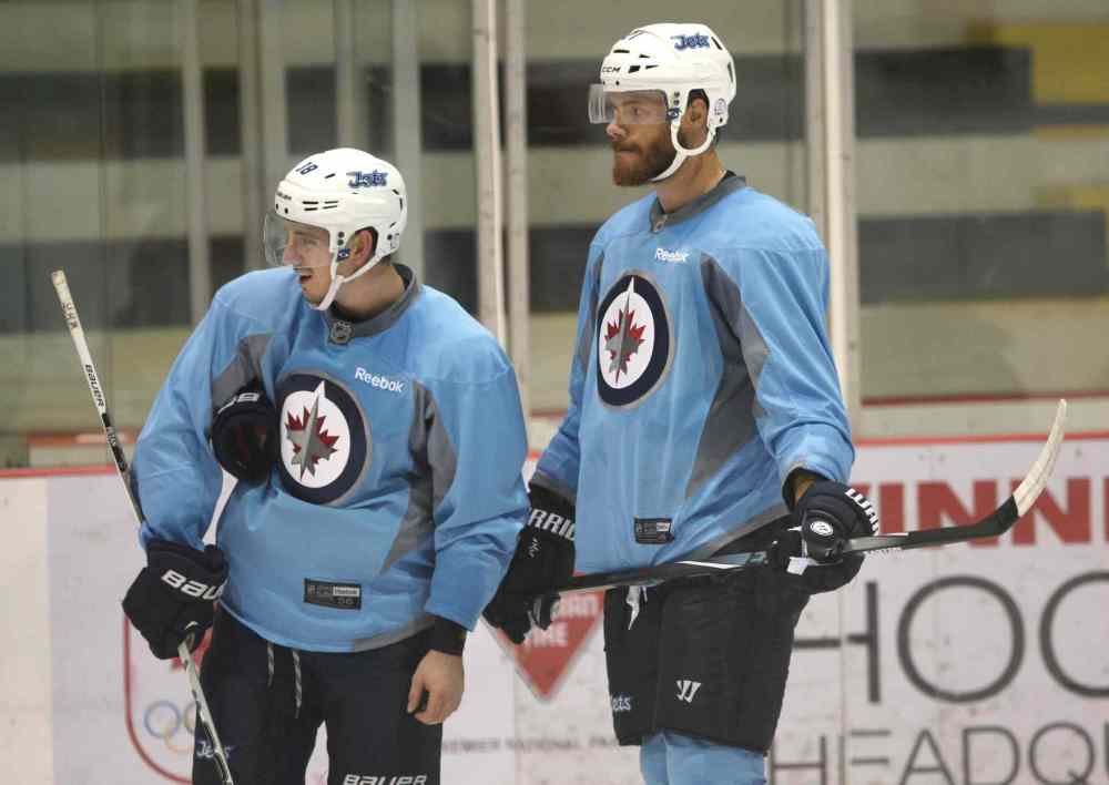 JOE BRYKSA / WINNIPEG FREE PRESS
Winnipeg Jets Nic Petan, and Thomas Raffl during practice at ice training camp on Sept 18, 2015.