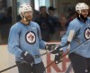 JOE BRYKSA / WINNIPEG FREE PRESS
Thomas Raffl (left) and Chris Thorburn during group 01 practice at Day 1 of on-ice training camp Friday at the MTS Iceplex in Winnipeg.