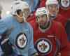 JOE BRYKSA / WINNIPEG FREE PRESS FILES
Jay Harrison (right) filled in admirably last season when the Jets were struggling with injuries. He played 35 regular-season games after being acquired in a trade.