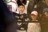 Young Winnipeg Jets fan, Kyran Broughton, 7, waits patiently to get his autograph book signed by players at the Jets Fanfare at MTS Iceplex Saturday. (Ruth Bonneville / Winnipeg Free Press)