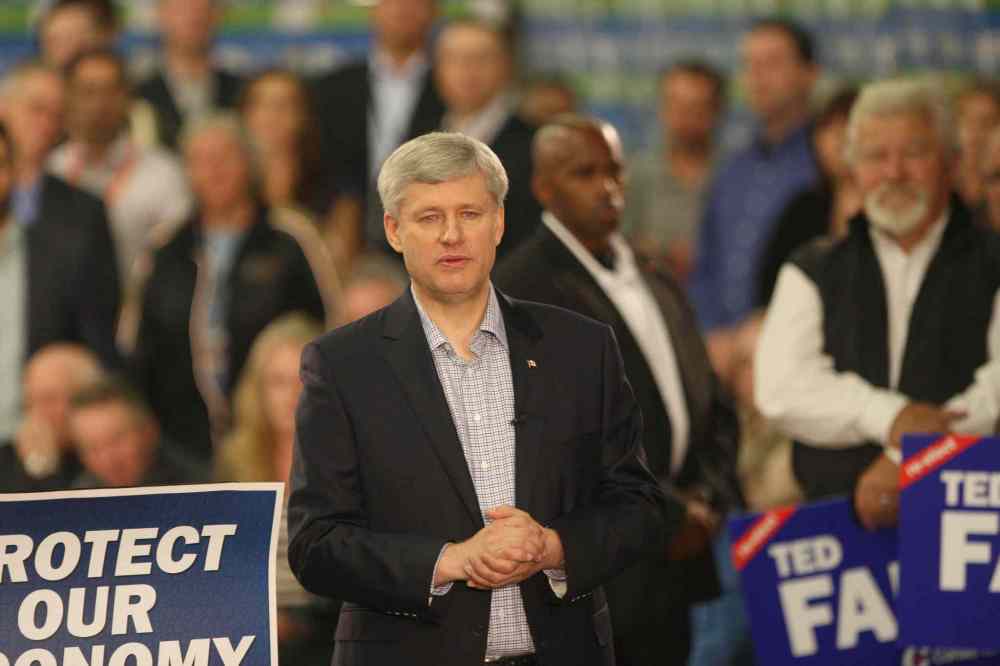 JOE BRYKSA / WINNIPEG FREE PRESS
Prime Minister Stephen Harper, who visited the Bison Transport warehouse for a photo opportunity, also vowed to create 1.3 million new jobs over the next five years.