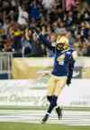 DAVID LIPNOWSKI / WINNIPEG FREE PRESS
Winnipeg Blue Bombers #4 Darvin Adams celebrates the first touchdown of the game against the Calgary Stampeders during first half CFL action at Investors Group Field Friday Sept. 25, 2015.