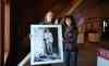 Ruth Bonneville / Winnipeg Free Press
Ray Dirks, curator of the Mennonite Heritage Centre Gallery and Belle Jarniewski of the Freeman Family Foundation Holocaust Education Centre show off one of the portraits from an exhibit honouring Albanian Muslims who hid Jews from the Nazis.
