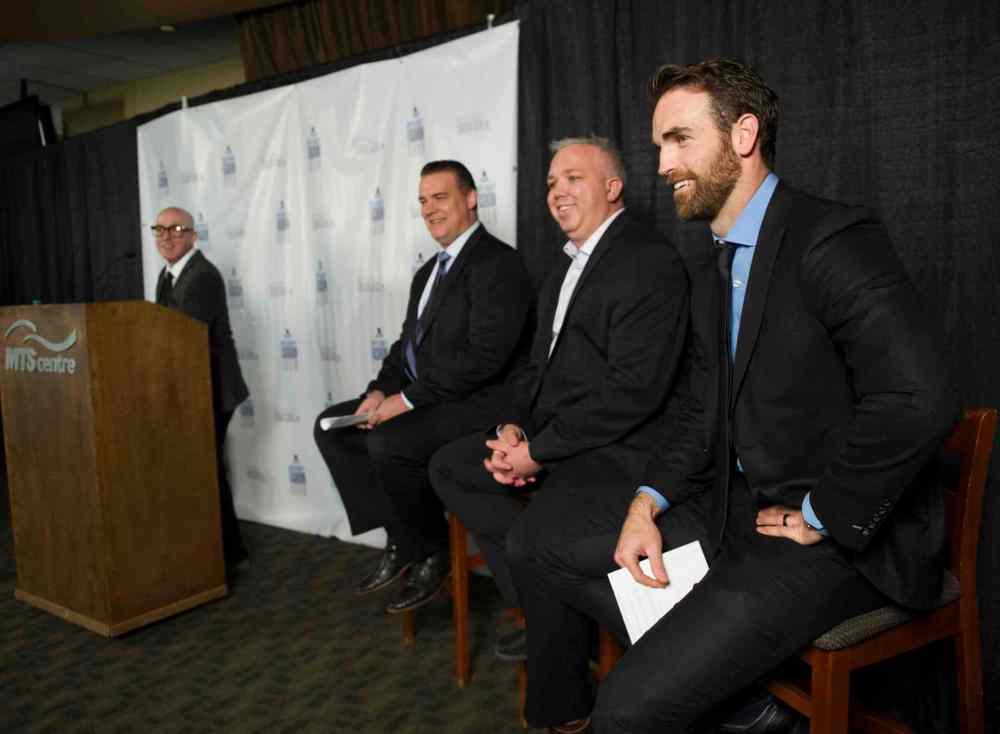 David Lipnowski / Winnipeg Free Press
(R-L) Winnipeg Jets captain Andrew Ladd, Winnipeg Jets True North Foundation executive director Dwayne Green, NHLPA Divisional Player Representative Joe Reekie, and MC Ace Burpee during a press conference at MTS Centre announcing a charity fashion event.