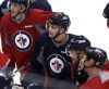 BORIS MINKEVICH / WINNIPEG FREE PRESS 
Adam Lowry (centre) and Winnipeg Jets teammates take instruction at practice at the MTS Centre Monday.
