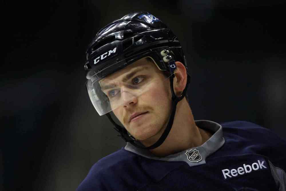 JOE BRYKSA / WINNIPEG FREE PRESS files
Winnipeg Jets Adam Lowry at practice today at the MTS Centre in preparation for the four-game Central Division road trip.