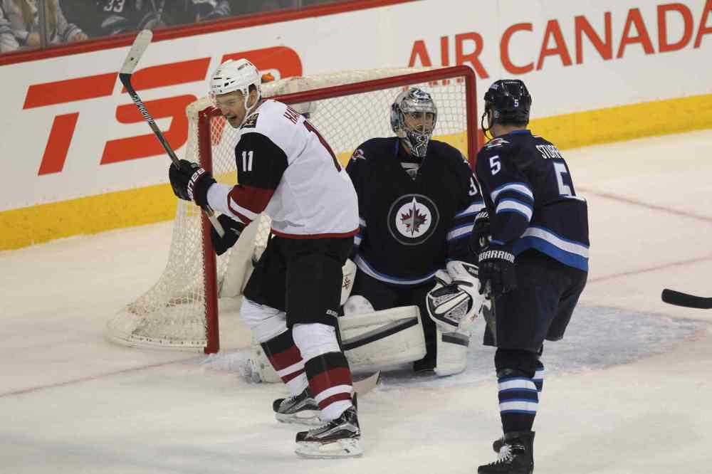 Ruth Bonneville / Winnipeg Free Press 
Arizona Coyotes'  Martin Hanzal (11) celebrates Connor Murphy's  (5) power play goal, the second goal of the night for the Coyotes, against the Winnipeg Jets during the first period.