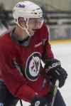 MIKE DEAL / WINNIPEG FREE PRESS
Tyler Myers continued practising with Toby Enstrom this morning at the MTS IcePlex.