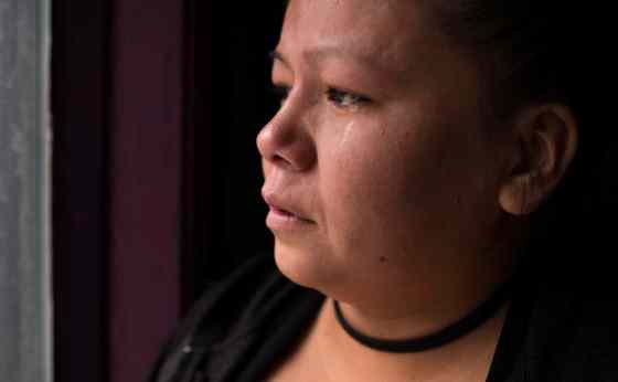 Mike Deal / Winnipeg Free PressTina Duck, birth mother to Tina Fontaine, stares out a window at the Windsor Hotel in downtown Winnipeg. Her daughters body was recovered from the Red River on August 17th, 2014. Winnipeg Police arrested Raymond Cormier last week in Vancouver in connection to her murder.
