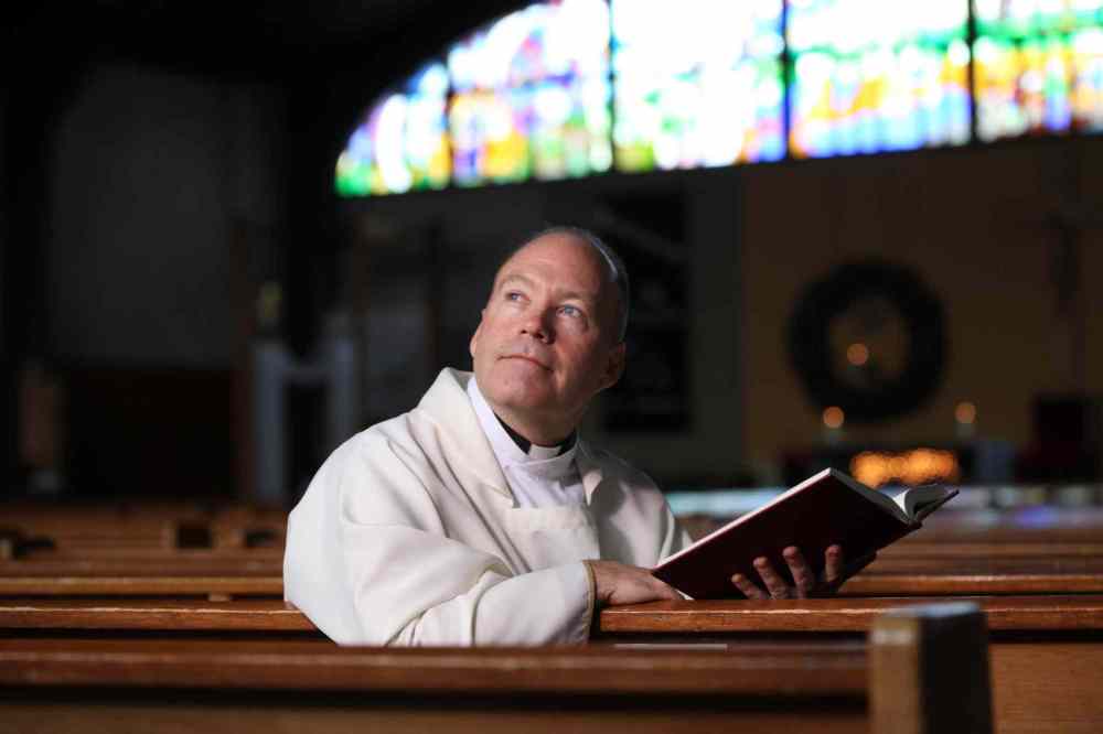 Ruth Bonneville / Winnipeg Free Press
Father Eric Giddins of St. Paul the Apostle Church is encouraging parishioners -- and all Manitobans -- to open their hearts to Syrian refugees.