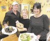 WINNIPEG FREE PRESS FILE PHOTOS
Above Caroline Rousseau (centre) with Chez Sophie owners Stephane and Sophie Wild.