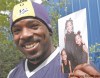 KEN GIGLIOTTI  / WINNIPEG FREE PRESS 
A proud Ike Charlton shows off a shot of his daughters (from left) Iniya, Tiah and Imari. 'That's why I play and why I plug along -- because they're here.'