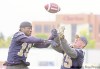 KEN GIGLIOTTI  /  WINNIPEG FREE PRESS 
DB Keyuo Craver (10) knocks down a football intended for slotback Aaron Hargreaves as Bombers practise Thursday for the Eskimos at Canad Inns Stadium tonight.