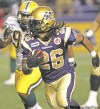JOE.BRYKSA@FREEPRESS.MB.CA 
Winnipeg's Yvenson Bernard runs away from the pursuit of Edmonton defender Jerome Haywood.