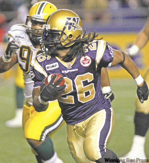 JOE.BRYKSA@FREEPRESS.MB.CA
Winnipeg's Yvenson Bernard runs away from the pursuit of Edmonton defender Jerome Haywood.