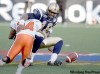 TREVOR HAGAN / FREE PRESS ARCHIVES
Bombers starting pivot Michael Bishop drops the ball under a sack attack from the Lions' Korey Banks on Sunday. Bishop is tied for the league lead in fumbles this season, with seven.