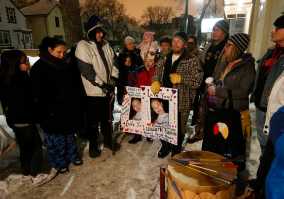 John Woods / Winnipeg Free PressFamily and friends of missing woman Claudette Osborne-Tyo gather for a vigil Sunday on Selkirk Avenue at King Street, where Osborne-Tyo made a payphone call before she disappeared in 2008.