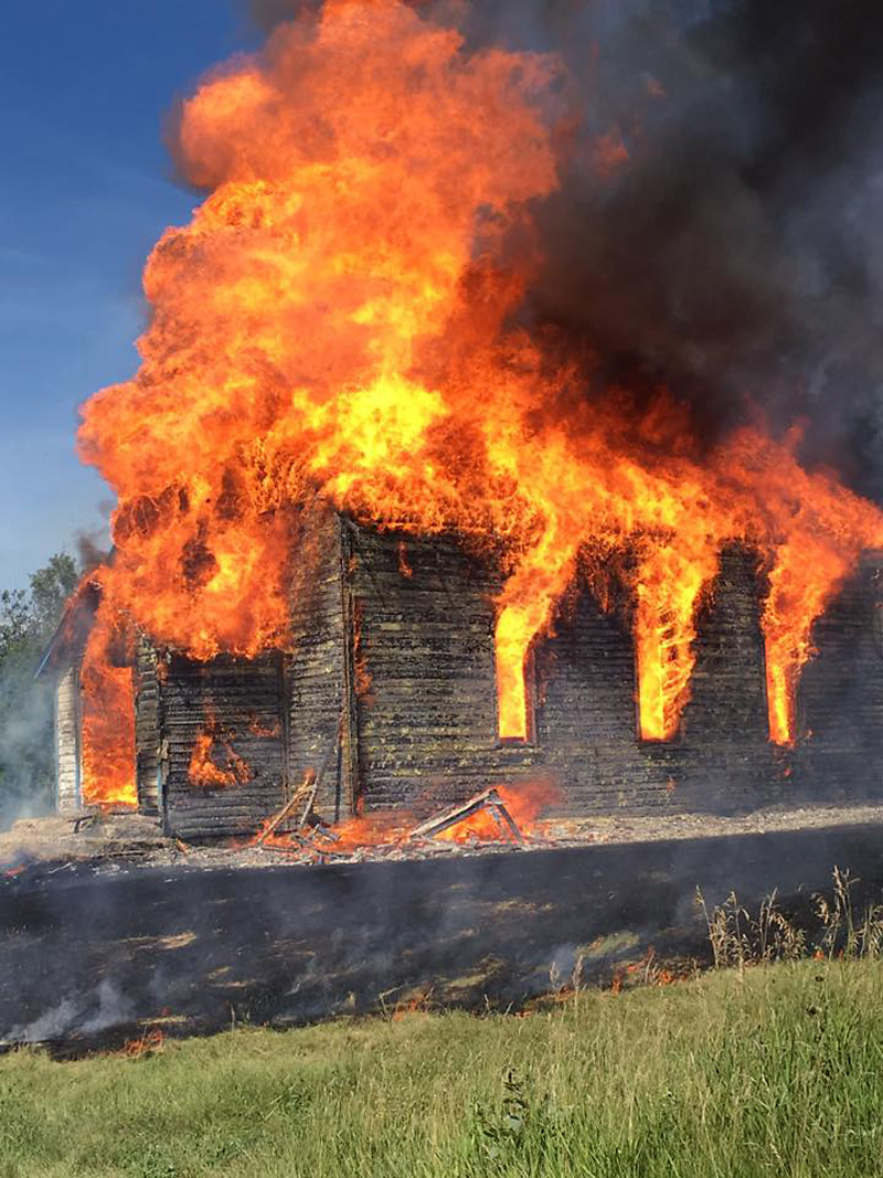 Supplied
St. Huberts Catholic church on Gambler First Nation burns to the ground on Friday. Hours before, elders from the First Nation and the Manitoba Métis Federation saved the bell from the abandoned church.