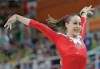 The Associated Press
Isabela Onyshko performs on the balance beam during the women’s artistic gymnastics qualification round at the 2016 Summer Olympics in Rio de Janeiro on Sunday.