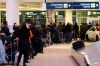 JOHN WOODS / WINNIPEG FREE PRESS
People wait in line for over an hour for taxis at the Winnipeg airport  Monday.
