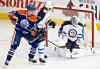 Jason Franson / The Canadian Press
Winnipeg Jets goalie Edward Pasquale (32) makes the save as Jacob Trouba (3) and Edmonton Oilers Jesse Joensuu (6) battle in front during second-period NHL pre-season action in Edmonton, Alta., Monday.