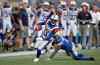 PHIL HOSSACK / WINNIPEG FREE PRESS
Montreal Alouettes' Stefan Logan scrambles to escape Winnipeg Blue Bombers' Roc Carmichael in the first half.