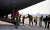 PHIL HOSSACK / WINNIPEG FREE PRESS
Northern Manitoba fire evacuees step off of a Canadian Forces C130 Hercules at James Richardson International Airport in Winnipeg.