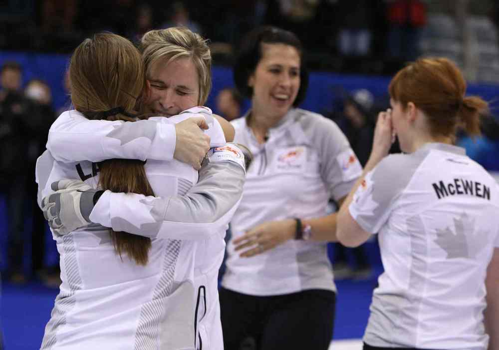 Jason Halstead / Winnipeg Free Press
Jill Officer (centre right) and Jennifer Jones (centre left) begin the next stage of their on-ice partnership and off-ice friendship with a quest for a gold medal in Sochi, Russia.