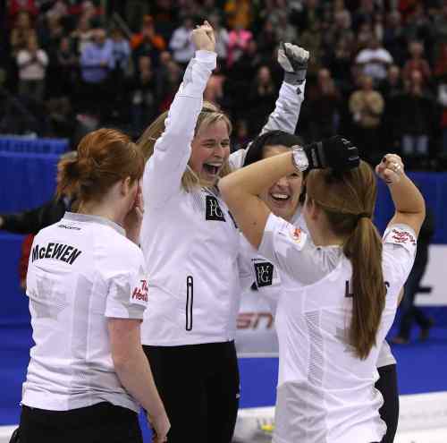 Jason Halstead / Winnipeg Free Press
From left: Dawn McEwen, Jennifer Jones, Jill Officer and Kaitlyn Lawes celebrate after defeating Sherry Middaugh 8-4 in the women's final of Roar of the Rings Olympic curling trials at the MTS Centre Saturday night.