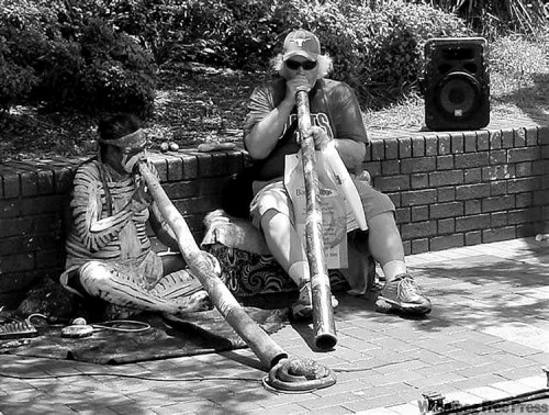 SuppliedAllan Besson and friend play the digeridoo the day after Christmas last year.