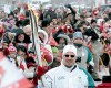 WAYNE  GLOWACKI@FREEPRESS.MB.CA
Lennie Plett carries the Olympic flame.