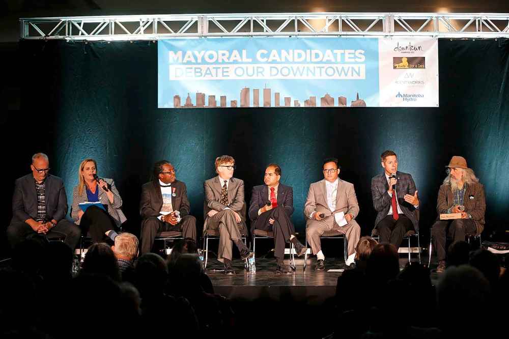 JOHN WOODS / WINNIPEG FREE PRESS
Mayoral candidates, from left, Tim Diack, Jennifer Motkaluk, Don Woodstock, Doug Wilson, Umar Hayat, Venkat Machiraju mayor Brian Bowman and Ed Ackerman take part in a mayoral debate at 360 Portage, Tuesday, Sept. 25.