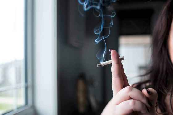 MIKAELA MACKENZIE / WINNIPEG FREE PRESSA cannabis dealer smokes a joint in Winnipeg on Saturday, Oct. 13, 2018. Winnipeg Free Press 2018.