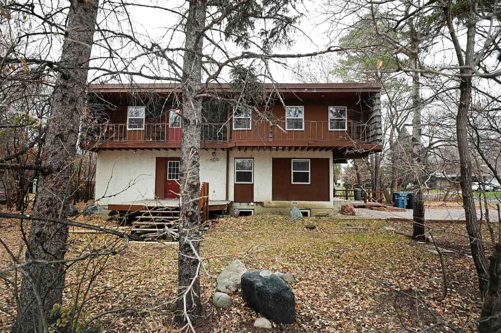 The 2,500-square-foot home was inspected by city officials Monday morning. The asking price is $449,900, according to realtor.ca. (Ruth Bonneville / Winnipeg Free Press)