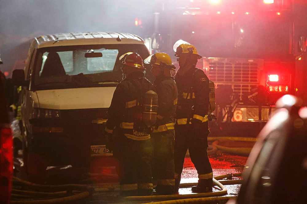 MIKE DEAL / WINNIPEG FREE PRESS
Winnipeg Fire Paramedic Service personnel work at putting out a house fire at 68 Prince Edward St. in the Point Douglas neighbourhood where two people are missing and may have died in the fire early Friday morning.
181026 - Friday, October 26, 2018.