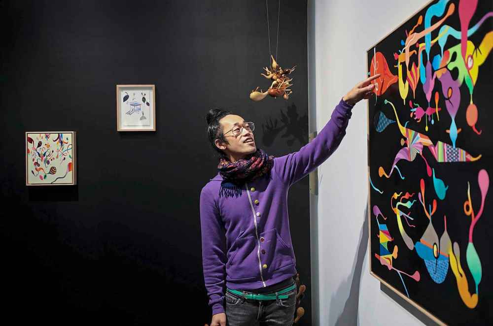 RUTH BONNEVILLE / WINNIPEG FREE PRESS
Local artist Takashi Iwasaki describes his work for the WAG's new exhibit called, Behind Closed Doors. the latest exhibition from the Winnipeg Art Gallery's New Contemporary series which describes the artist's creative process in their studio and their research from the museum vault.