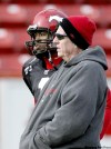 MIKAEL KJELLSTROM / CANADIAN PRESS ARCHIVES
Stamps quarterback Henry Burris chats with GM Jim Barker, who tops a three-man short list for the Bombers' vacant GM post.