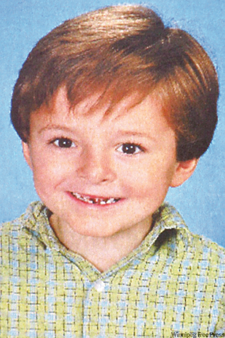 CP
FILE--Cordon Schoenborn, 5, is shown on a framed picture at the memorial wall in Merritt, B.C on Thursday April 10, 2008. The trial began Thursday for a father of three children found dead in their Merritt, B.C., home last year. Allan Schoenborn is accused of three counts of first-degree murder in the deaths of five-year-old Cordon, eight-year-old Max and their 10-year sister Kaitlynne Schoenborn. THE CANADIAN PRESS/Terry Theodore