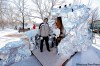 BORIS MINKEVICH / WINNIPEG FREE
BORIS.MINKEVICH@FREEPRESS.MB.CA Tannis Broda and Josh Braaksma check out a warming hut called Apparition.