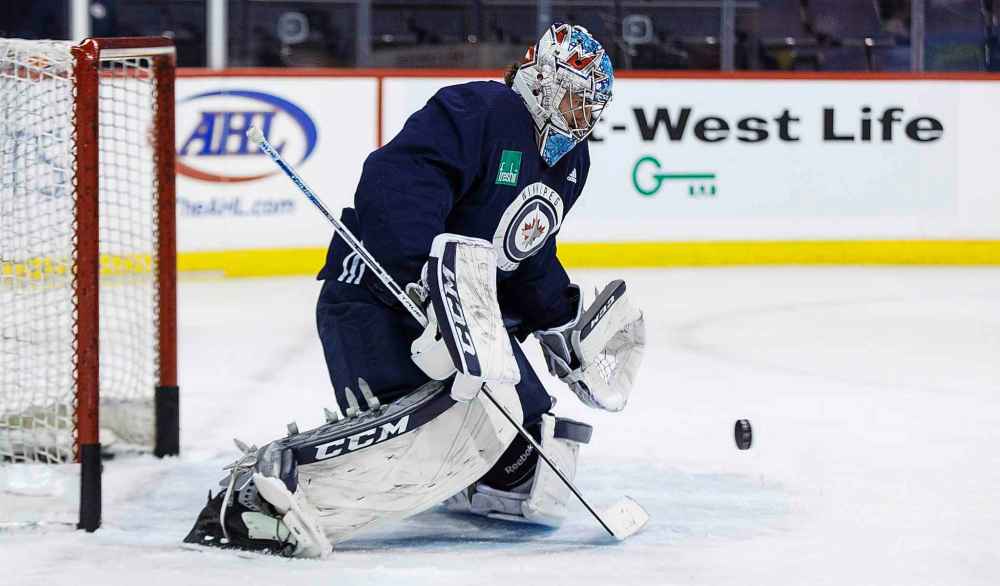 MIKE DEAL / WINNIPEG FREE PRESS
After letting in a few pucks at practice on Wednesday, Hellebuyck showed a little rage on the ice.