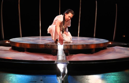 Ruth Bonneville
Alone on a circular platform, Aria Evans physically interprets the words and song of Natalie Sappier, a Wolastoqiyik artist from Tobique First Nation in New Brunswick. (Ruth Bonneville / Winnipeg Free Press)