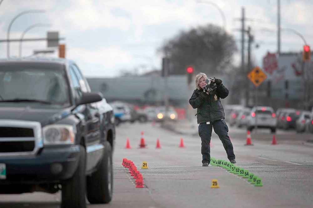 Police investigate a pedestrian-vehicle collision on McPhillips Street between Jarvis and Selkirk avenues March 30.
PHIL HOSSACK / WINNIPEG FREE PRESS FILES