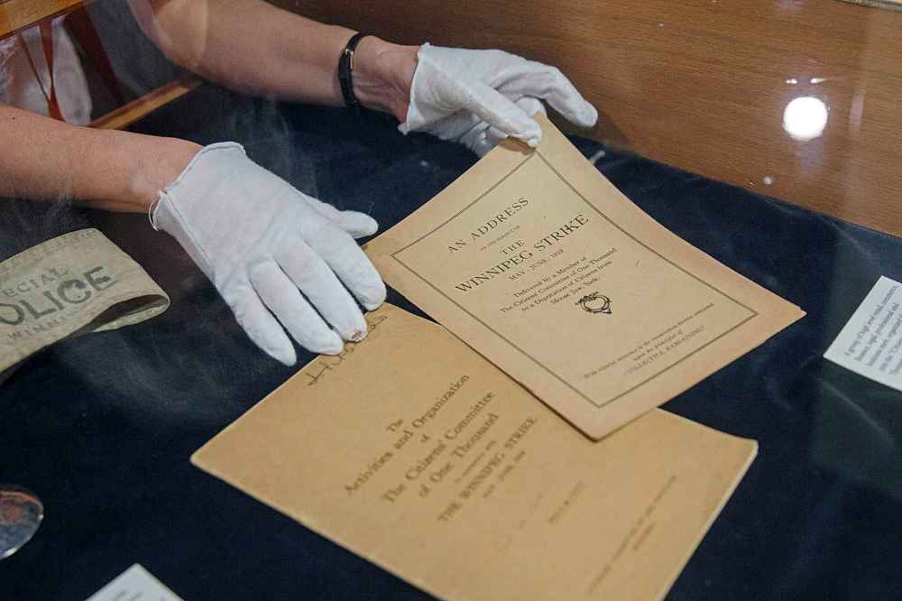 MIKE DEAL / WINNIPEG FREE PRESS
Shelley Sweeney University of Manitoba Archivist, Head of Archives & Special Collections, organizes a display of pamphlets and other items regarding the Winnipeg General Strike.