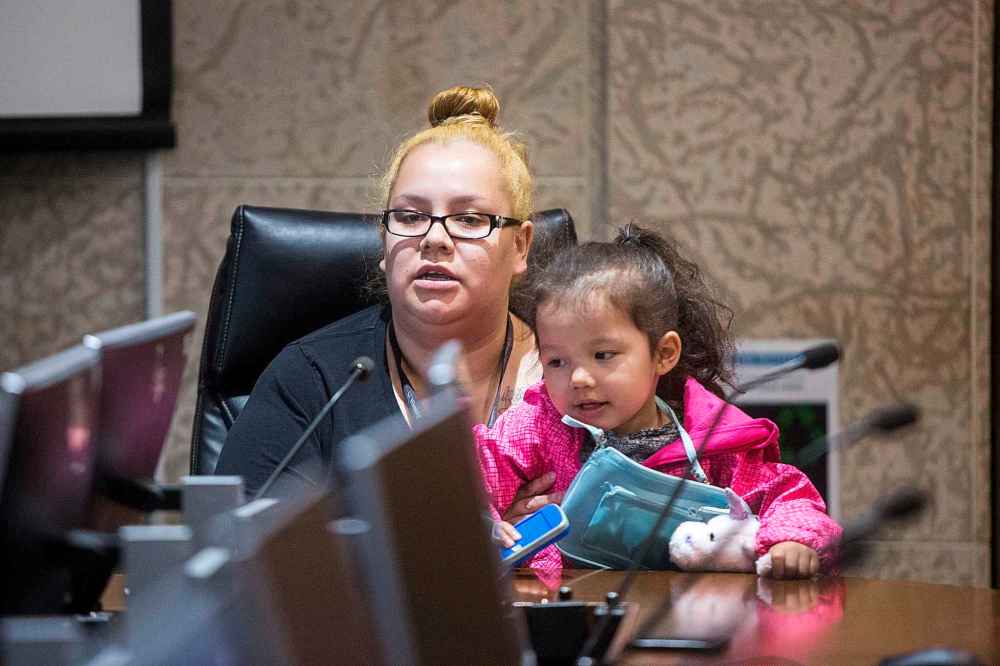 Lolanda Ducharme, seen with Semiah's sister, spoke in opposition to the appeal of an extremely dangerous dog designation. (Mikaela MacKenzie / Winnipeg Free Press)