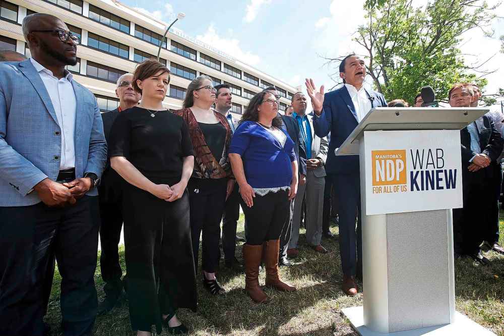 JOHN WOODS / WINNIPEG FREE PRESS FILES
Kinew meets with his candidates and the media for a pre-election press conference outside the Misericordia Health Centre in June.